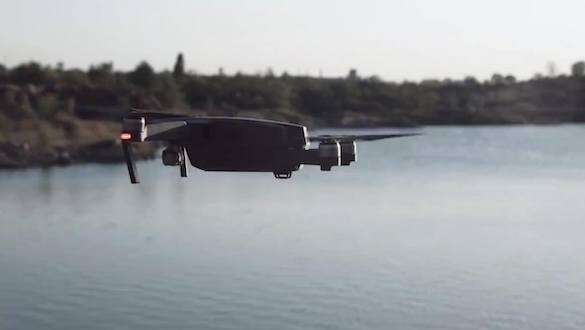 Drone flying over water