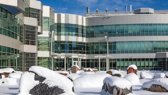 Science building outside with snow on the ground