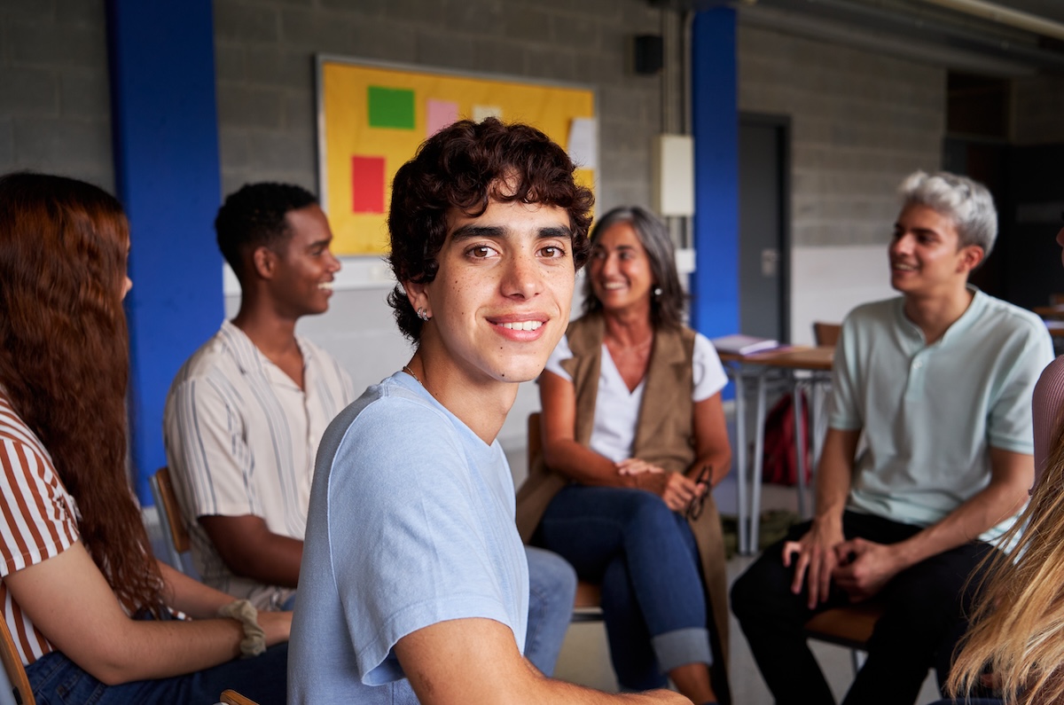 Young man in a group setting