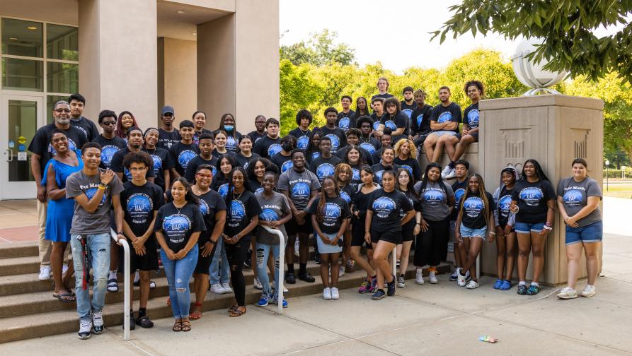 Group photo with Director of UAP, D\wn Stanton, Advisors, and students.