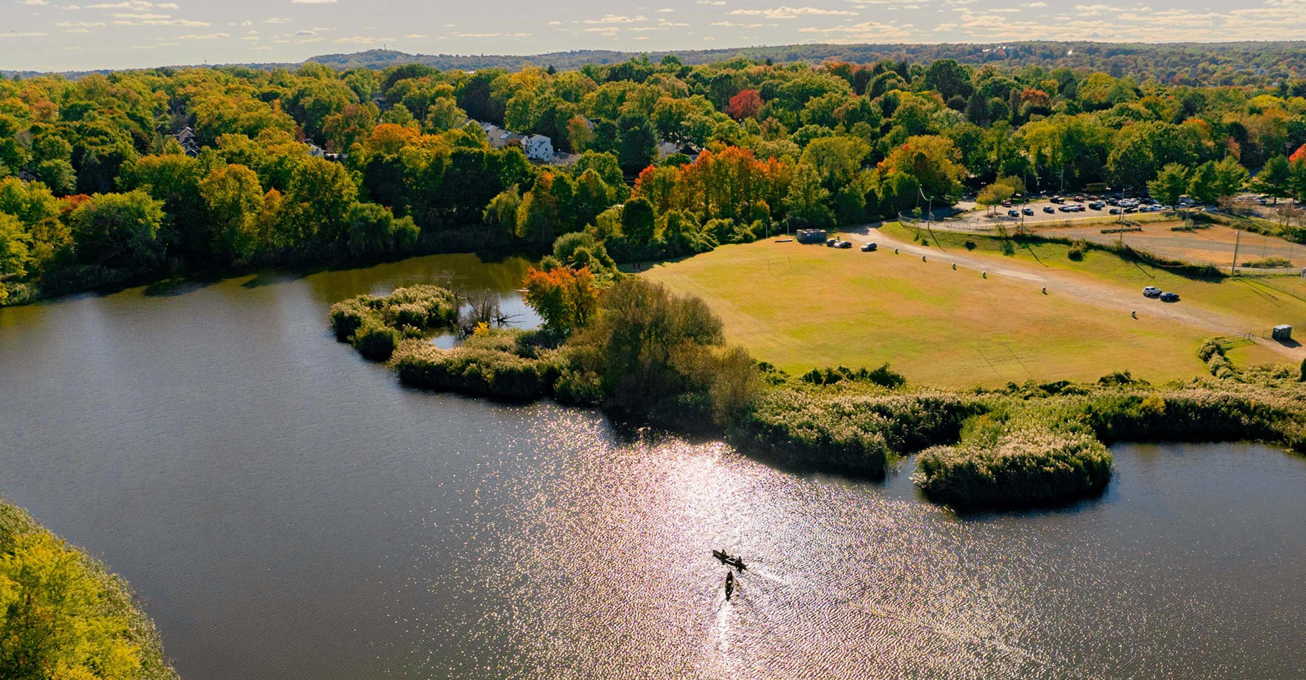 a view from above as students learn to navigate Beaver Pond by canoe with Joe Milone, associate professor of Recreation, Tourism and Sport management.