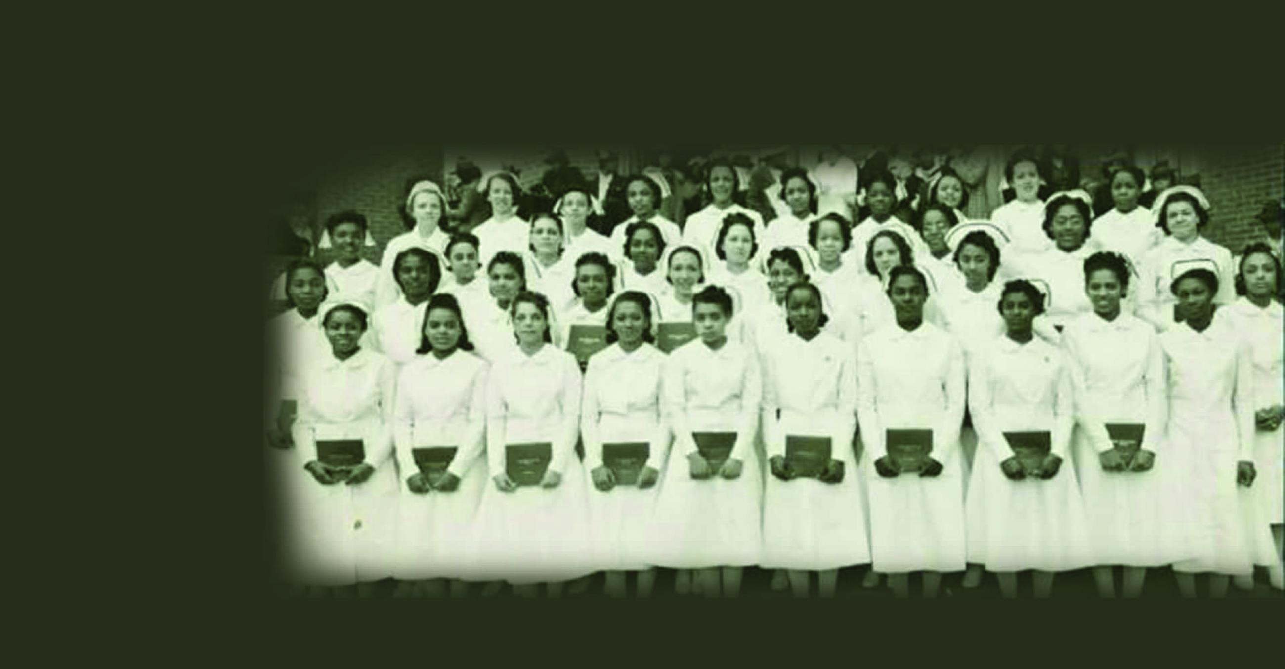 a black and white vintage photo of a group of Black nurses in white uniforms