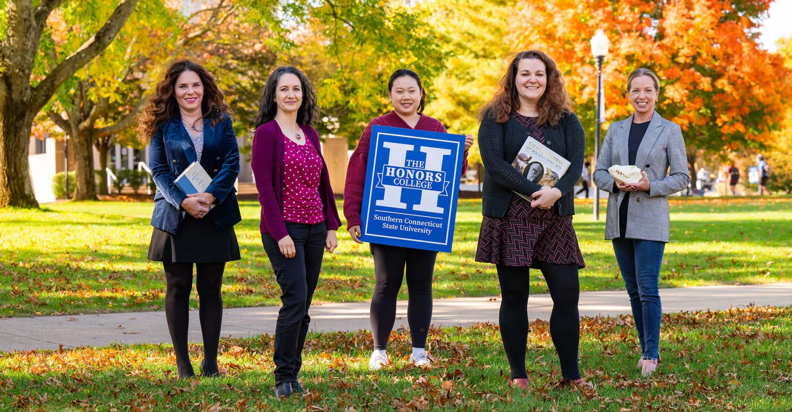 The Honors College team (from left): Darcy Kern, associate professor of history; Gayle Bessenoff, associate professor of psychology; Jen Ng, university assistant; Sarah Roe, director of the Honors College and associate professor of history; and Miranda Dunbar, professor of biology