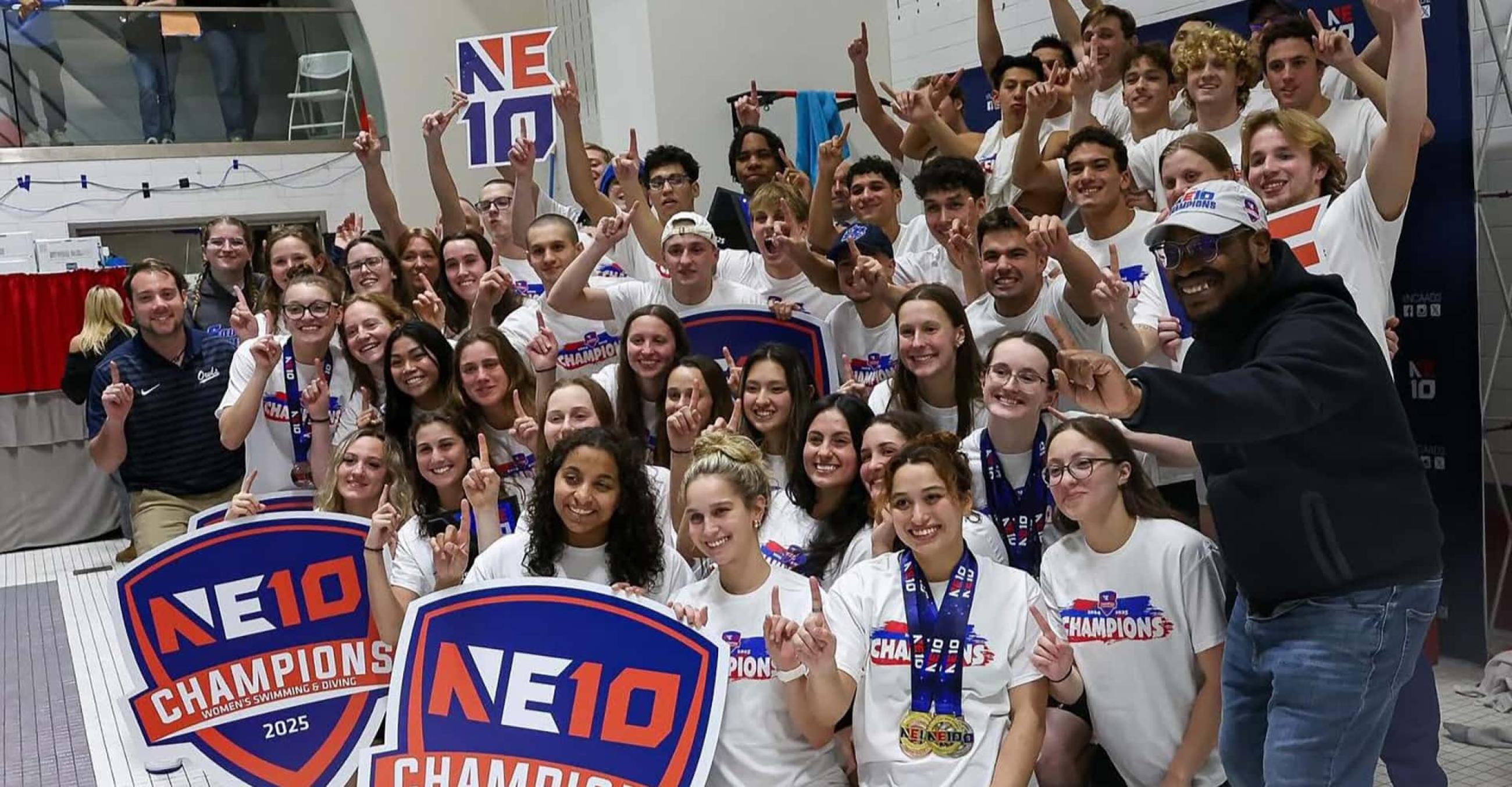 SCSU Women’s and Men's Swimming and Diving teams, alongside SCSU Athletic Director Terrance Jones, celebrate after winning the 2025 Northeast-10 Championships. 