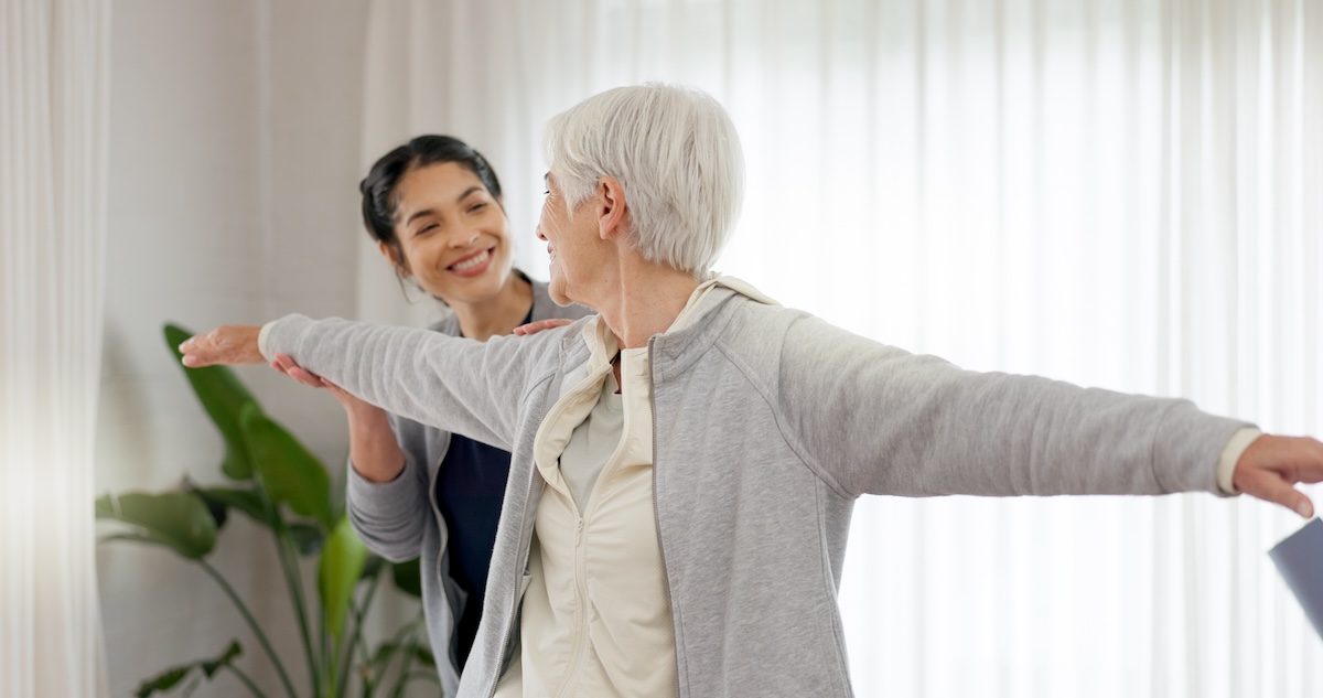 Woman coaching an elder